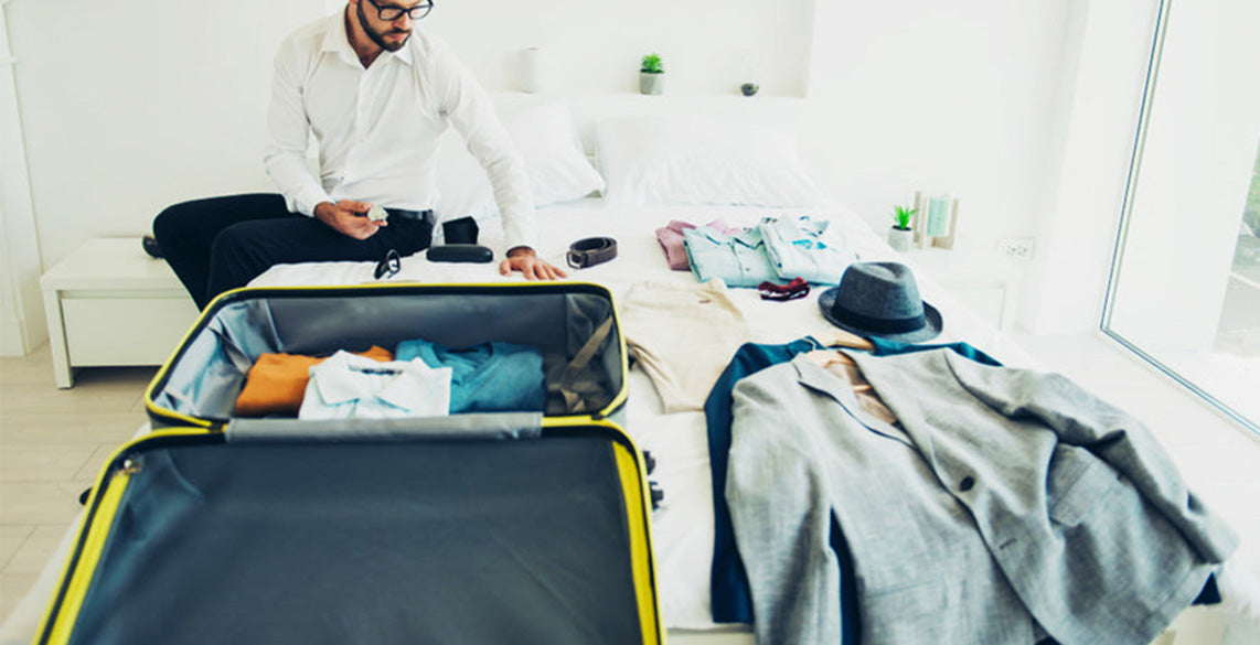 homme-valise-costume